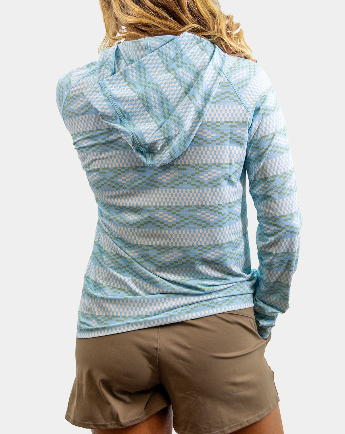 Women’s light blue performance fishing hoody with hood and UPF 50 sun protection