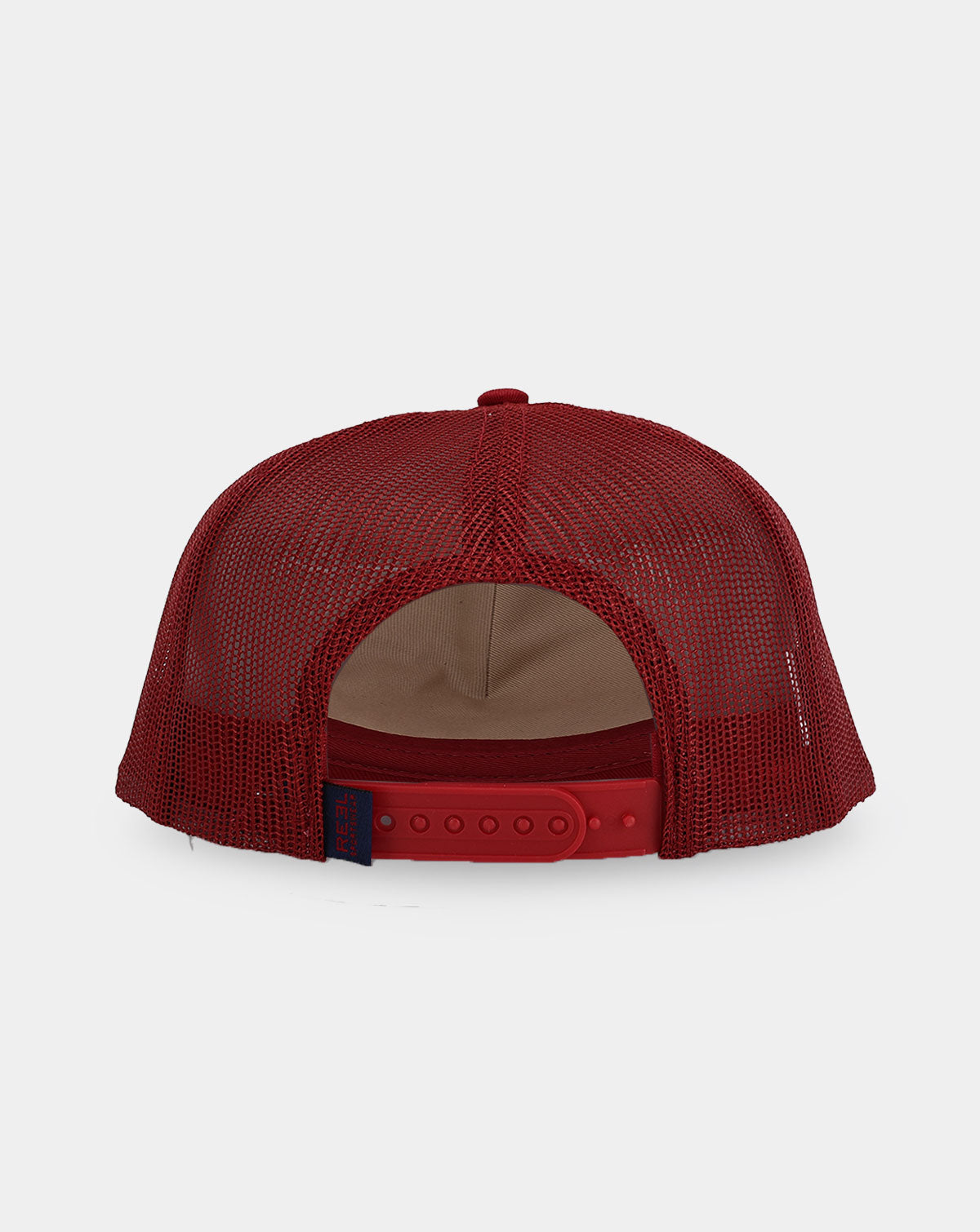 Reel Sportswear Dawson Red Trucker Hat — back view showing red mesh panels and adjustable snapback closure with navy RS branded tag