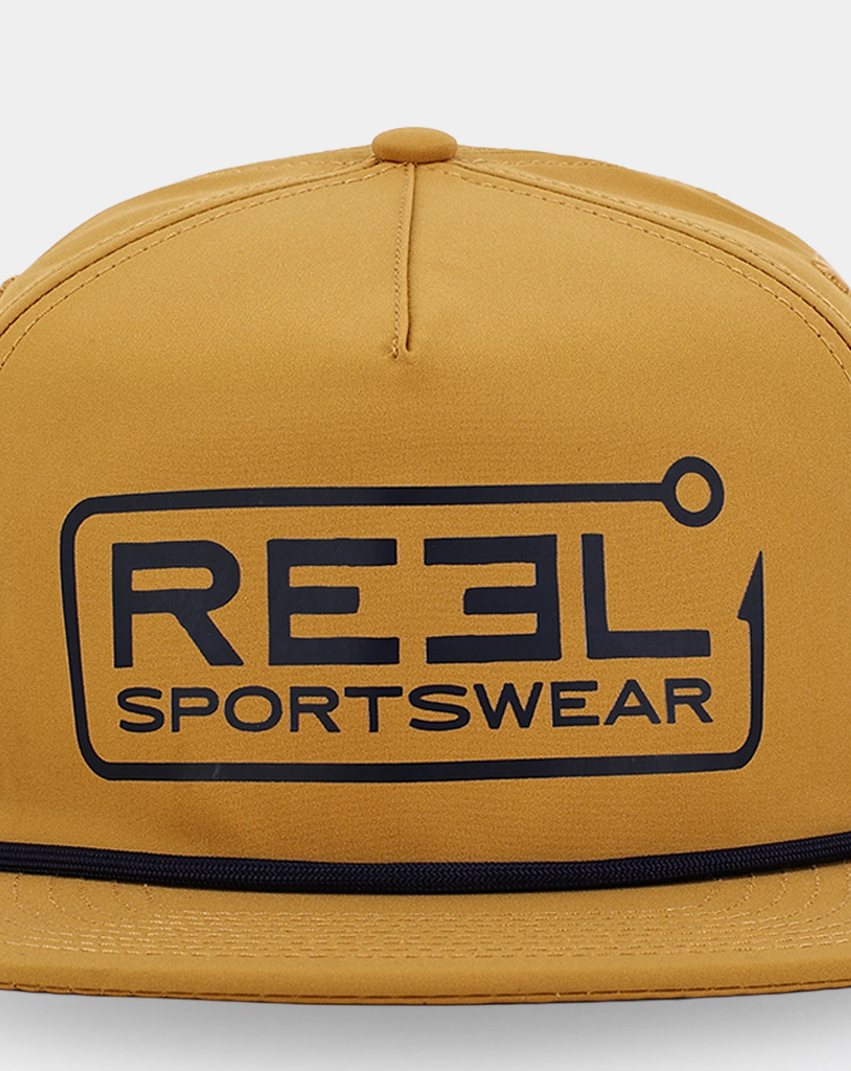Reel Sportswear Wayside Snapback — close-up of navy hook-and-line framed badge graphic screen printed on mustard nylon front panel