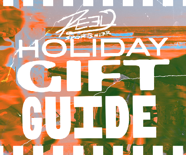 Promotional graphic for 'Holiday Gift Guide' with colorful abstract design and text overlay.