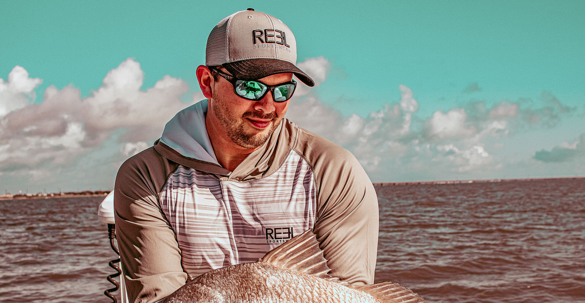 Capt. Jeremy Torres, Fishing on upper laguna madre, reel sportswear fishing apparel and clothing. 
