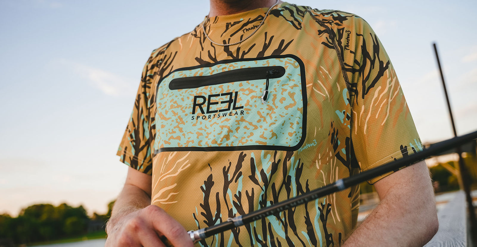 Wingshot men's performance fishing short sleeve shirt. Pocketed performance Fishing shirt