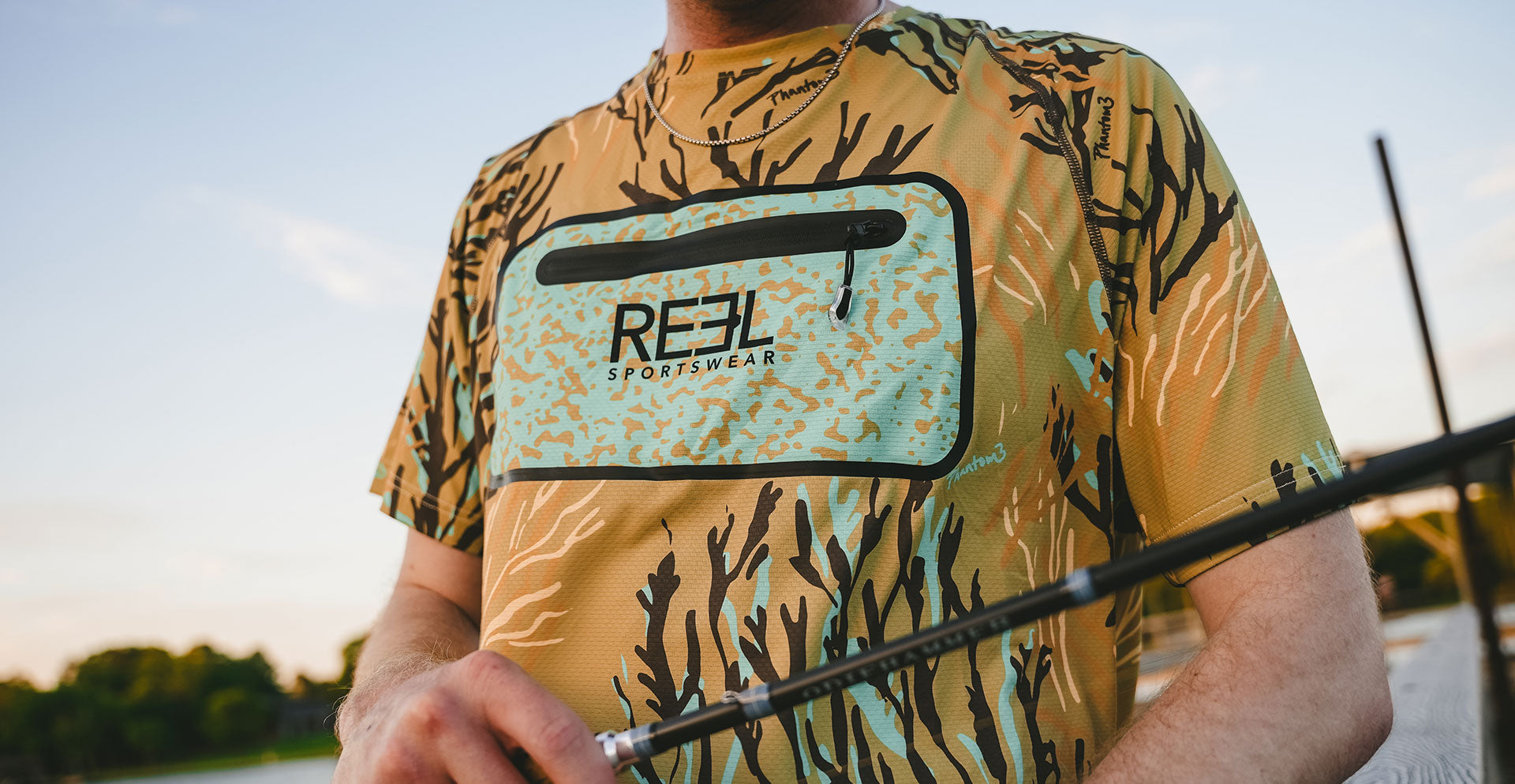 Wingshot men's performance fishing short sleeve shirt. Pocketed performance Fishing shirt