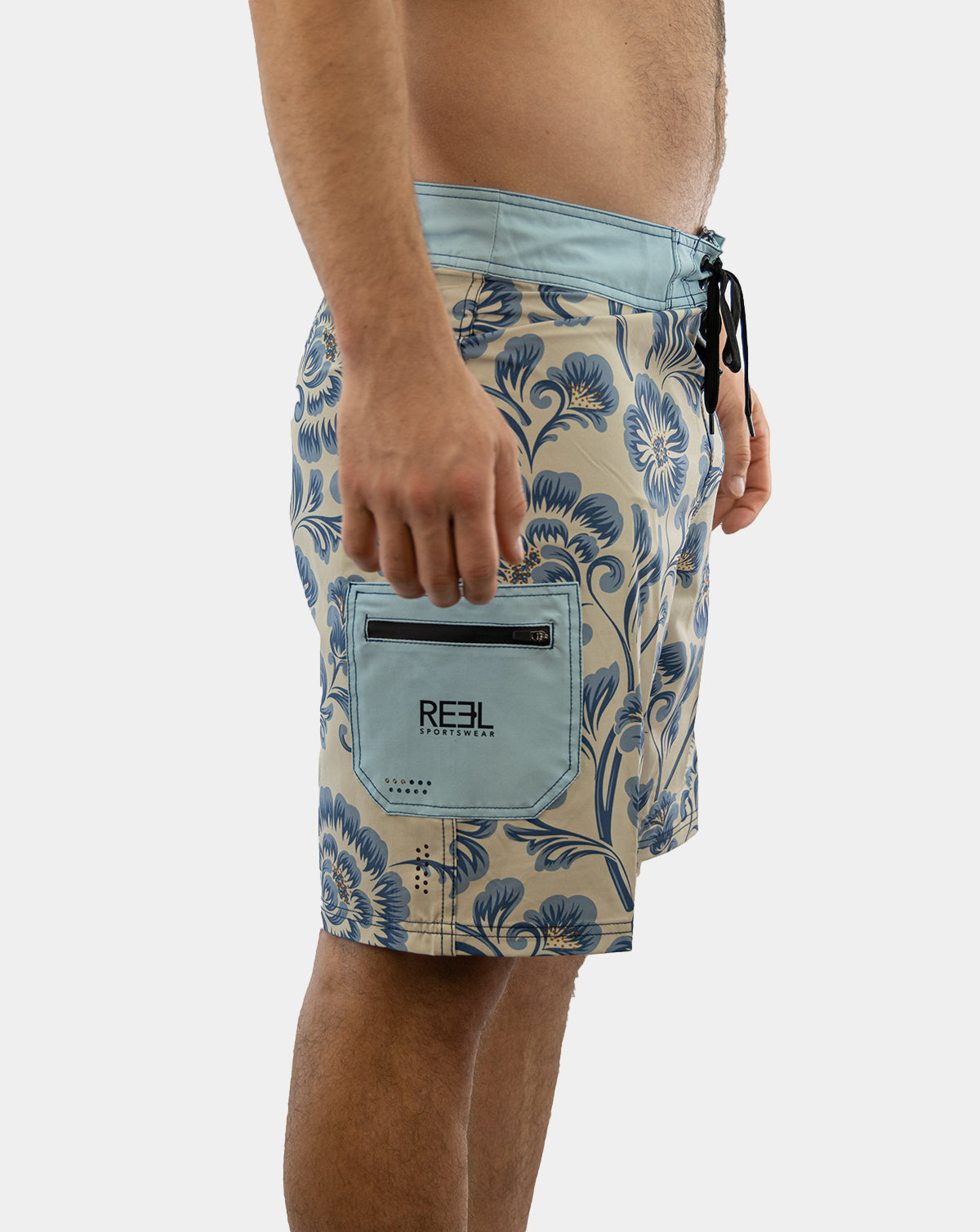 Stylish Sturgill Men's Boardshorts featuring bold floral print in shades of blue and antique white.