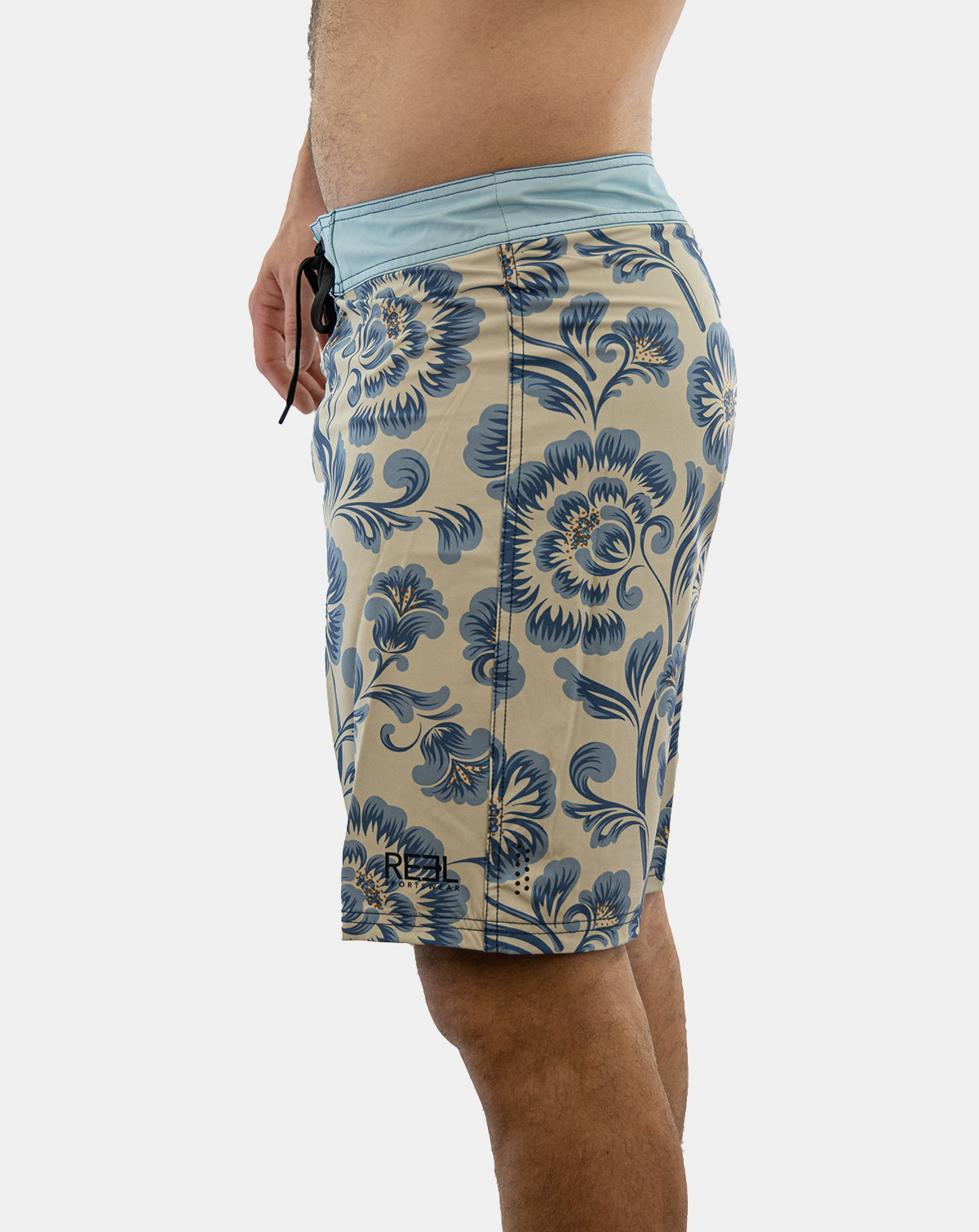 Stylish Sturgill Men&#39;s Boardshorts featuring bold floral print in shades of blue and antique white.